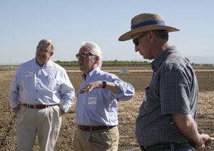 Left to right, farmer John Diener, U.S. Rep. Jim Costa and UCCE farm advisor Dan Munk.