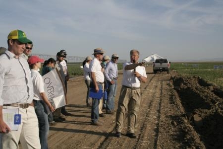 Jeff Mitchell addresses farmers at last year's twilight CT field day.