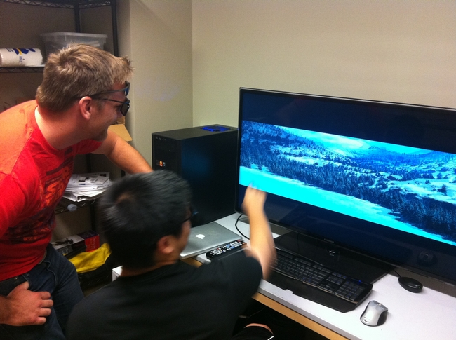 Viewing a virtual scene in 3D. Students Jacob Flanagan and Lawrence Lam at the UC Merced Spatial Lab.