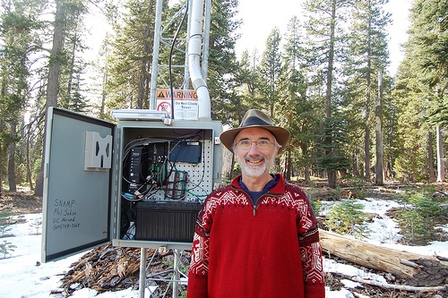 UC Proffesor Roger Bales and the meteorological station data collector