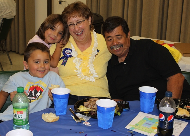 Kathy Montanez with her husband Gilbert and grandchildren Dian and Calfee.