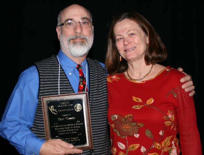 Paul Vossen, UC Cooperative Extension advisor in Sonoma and Marin counties, accepted the Pedro Ilic Award from Shermain Hardesty, director of the UC Small Farm Program.