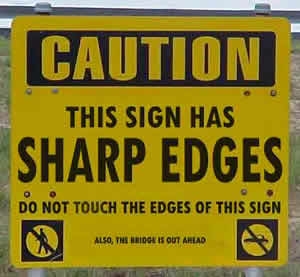 This sign has sharp edges... Also the bridge is out ahead